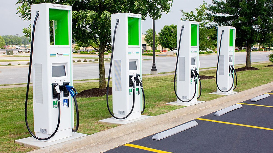 Professional EV charging stations installed by Get Green NOI, showcasing modern charging infrastructure with green displays